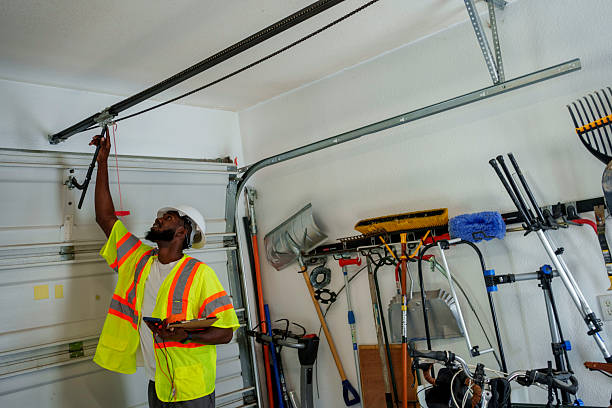 Professional Garage Door Spring Repair technician working in Wartburg, TN
